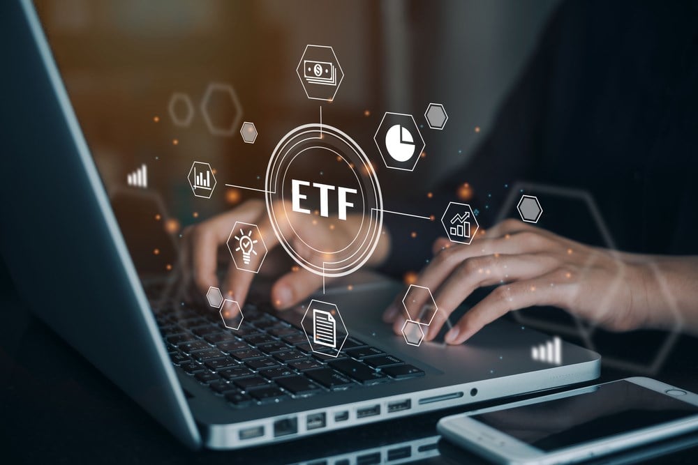 Person working on computer search for ETFs using an ETF screener